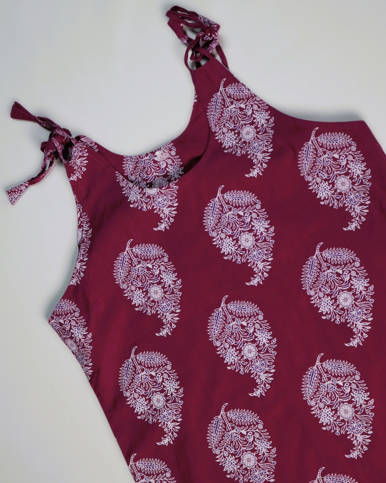 Maroon Paisley Print Cotton Slip Dress for Women with adjustable tie straps and elegant paisley print.
